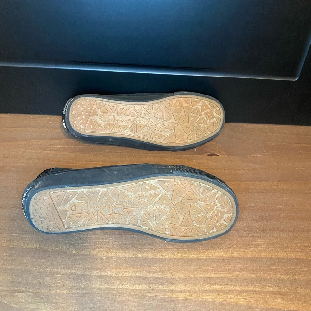 Champion black slip-ons size 5.5Y (kids size), size 7 in women’s